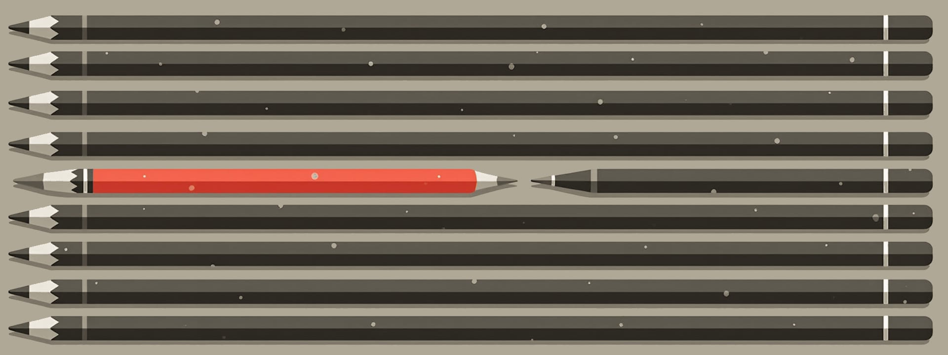 Rows of pencils lying side by side, one of them red.