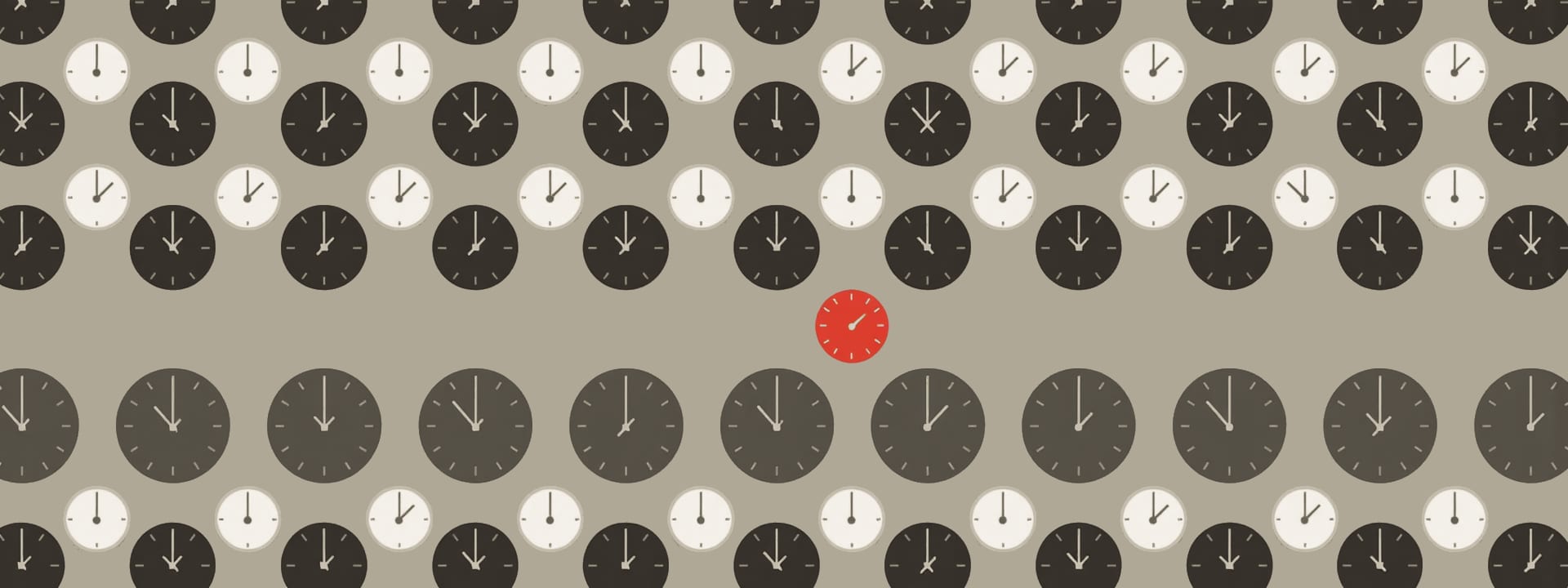 A pattern of dark and light round clocks without numbers, one clock in red.