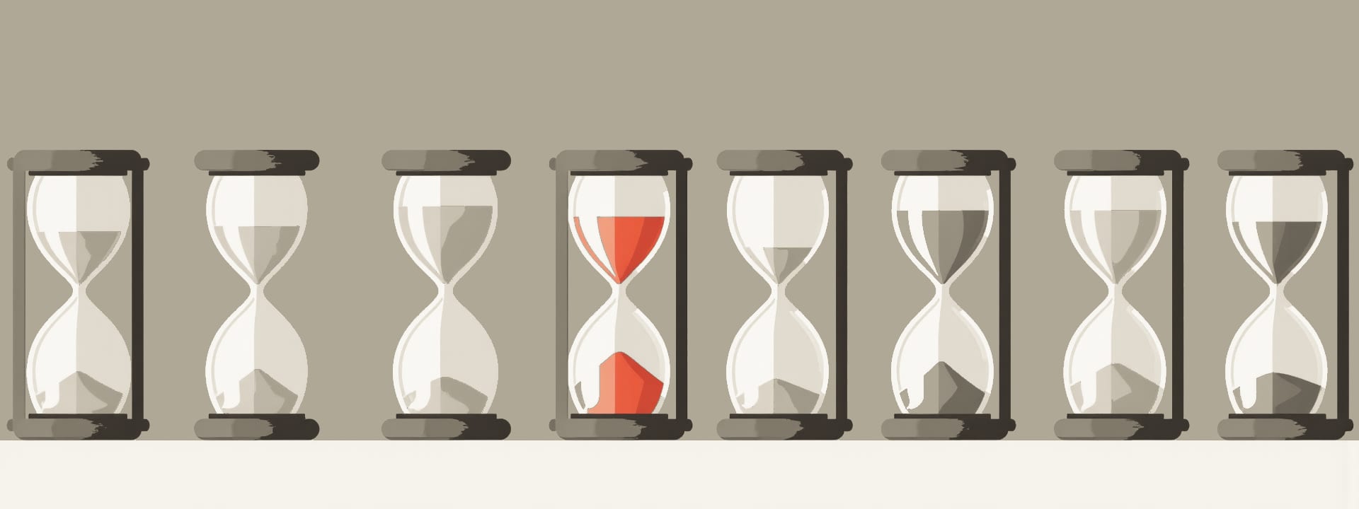 A row of identical hourglasses, one with red sand.